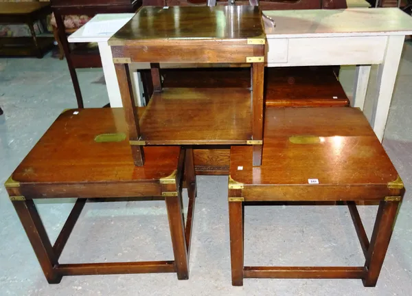 A set of three 20th century mahogany campaign style tables, of various sizes, 55cm wide x 51cm high, 44cm high and 41cm high, (3). B7