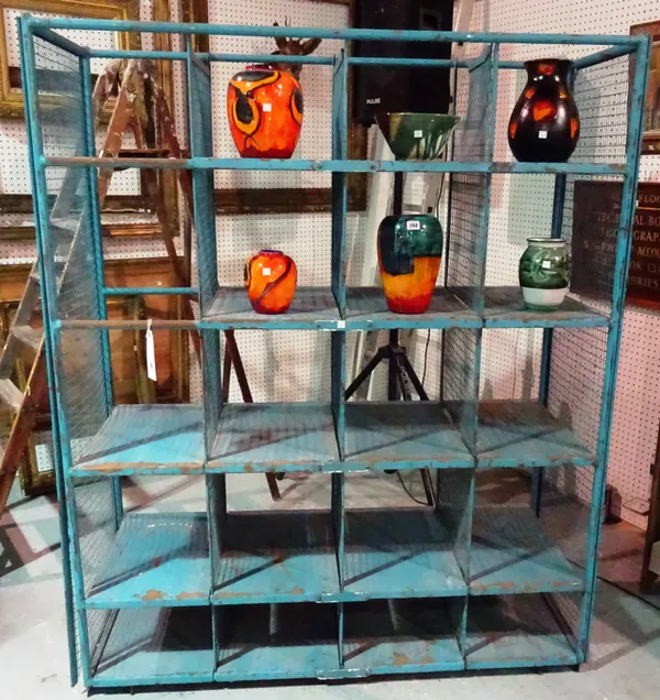 A 20th century blue painted set of industrial shelves, 142cm wide x 177cm high. CAB