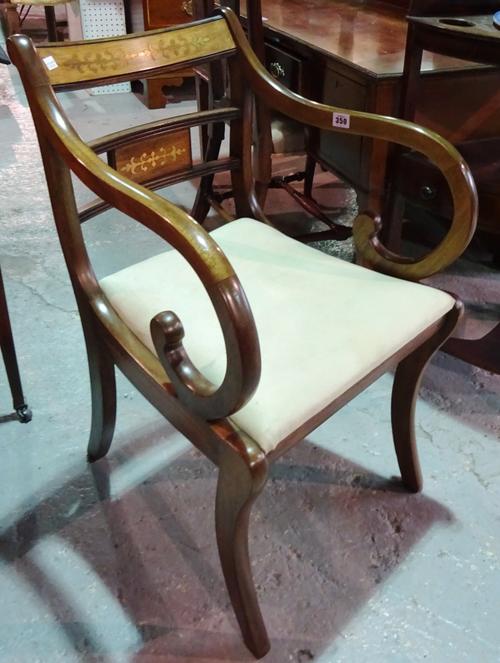 A Regency style mahogany and brass inlaid open armchair, on cabriole supports. D7