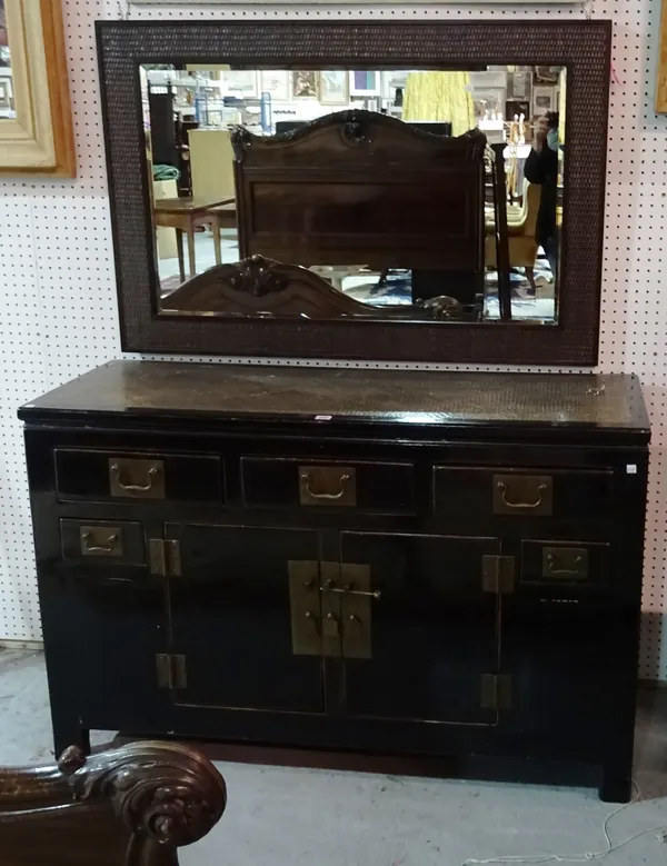 A 20th century Chinese black lacquer sideboard, with three long and two short drawers over a cupboard base, 133cm wide x 84cm high, together with an a