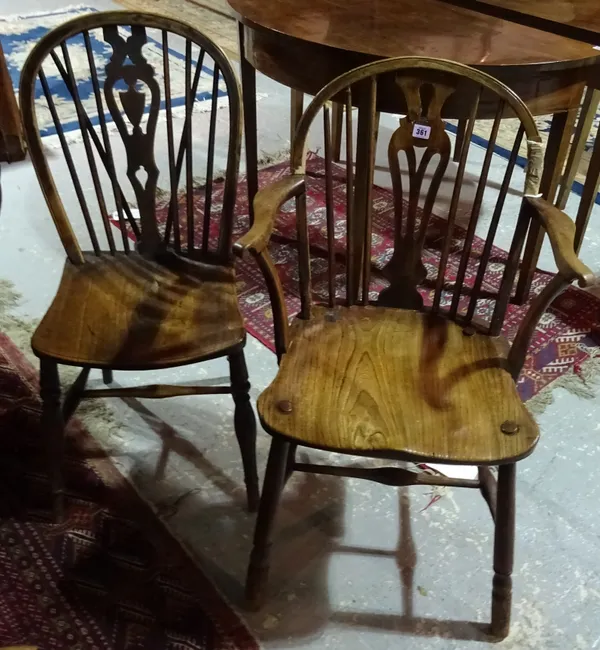 A matched set of four 19th century ash and elm stick back dining chairs, (a.f) (4). H8