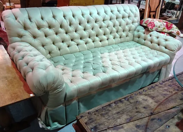 A 20th century deep green button upholstered sofa, 203cm wide x 84cm high. D4