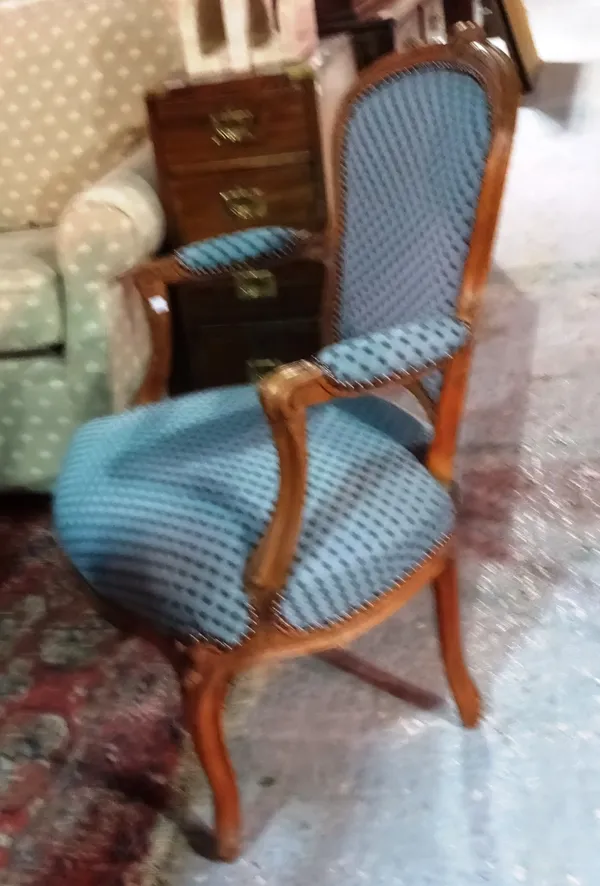 A Louis XV style walnut fauteuil with blue upholstery. G4