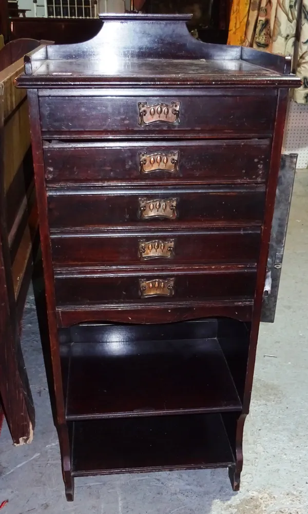 An Edwardian walnut five drawer music cabinet, 50cm wide. J4