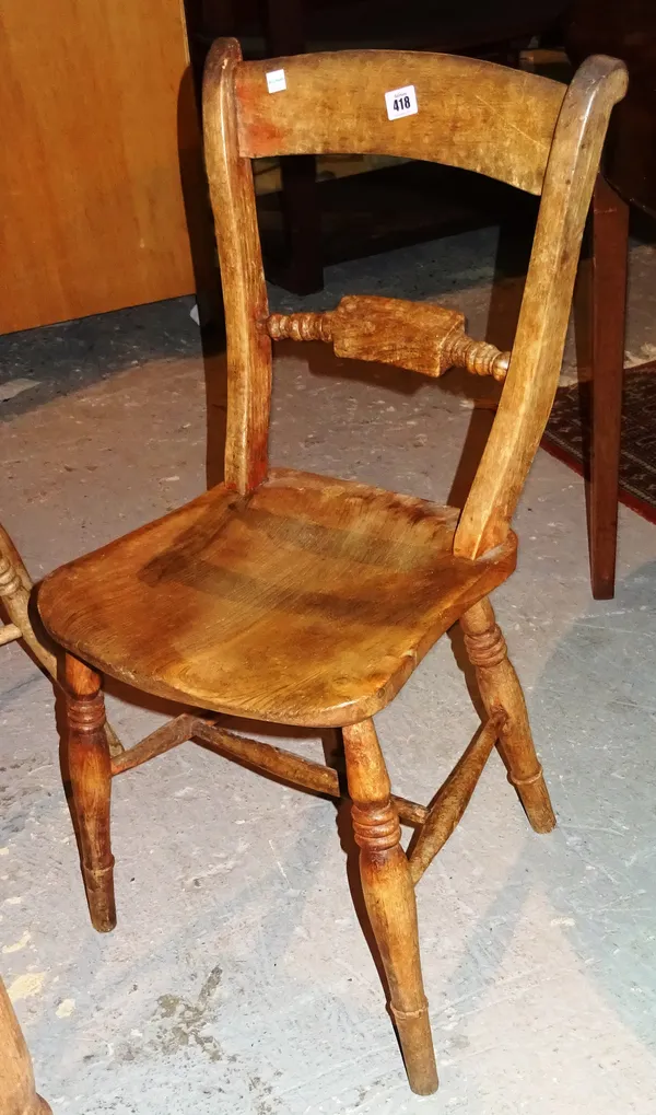 A set of four late Victorian pine knife back side chairs, (4).  L7