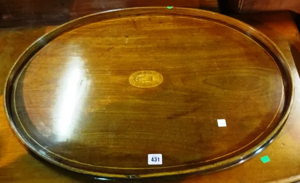 A large 20th century mahogany oval gallery tray, 75cm wide and two swing frame toilet mirrors, (3).  L8
