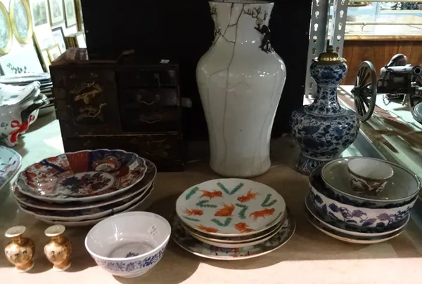 Oriental ceramics, including; a large white crackle glaze vase, imari decorated plates, a lacquer table cabinet and sundry, (qty).  S3