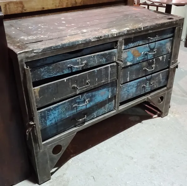 A 20th century industrial designed metal bound chest of eight short wooden drawers, 127cm wide x 86cm high x 60cm deep.  J4