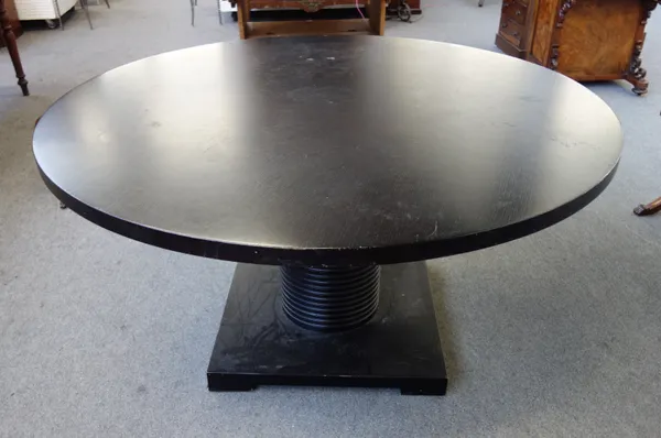 Mood Flexform; a late 20th century ebonised circular dining table, with ribbed column on square base, 150cm diameter x 77cm high.  F8