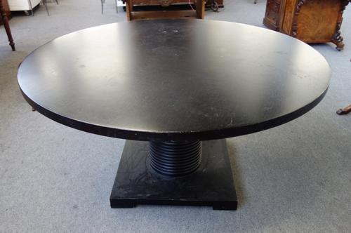 Mood Flexform; a late 20th century ebonised circular dining table, with ribbed column on square base, 150cm diameter x 77cm high.  F8