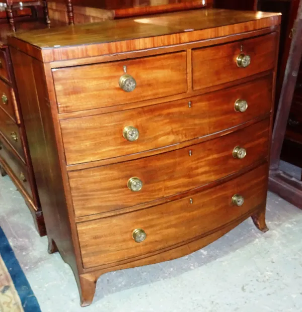 A 19th century mahogany bowfront chest of two short and three long drawers, 102cm wide x 106cm high. L7