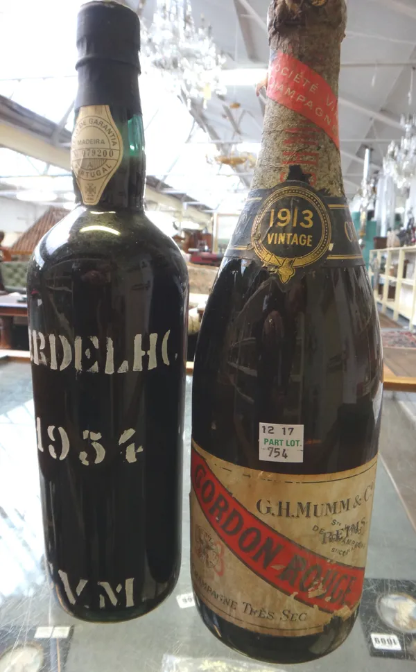 One bottle of 1913 Gordon Rouge vintage champagne, and one bottle of 1954 Leacock & Co Verdelho Madeira, (2).