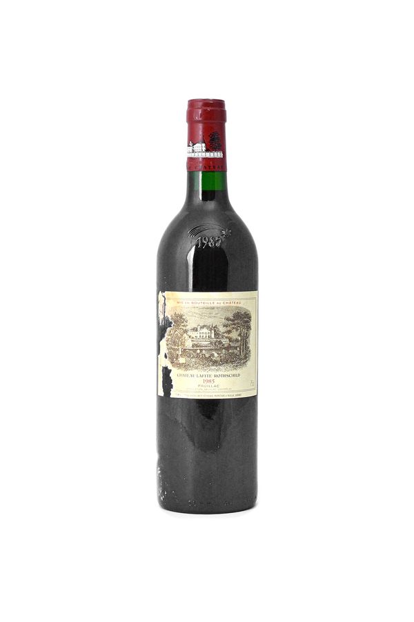 A bottle of 1985 Chateau Lafite Rothschild Pauillac.
