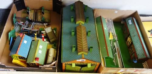 A Hornby O gauge 'No.2' tinplate locomotive shed, two Hornby tinplate stations/platforms; 'Wembley' and 'Reading', with working electrics, level cross