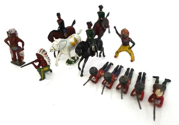 A quantity of Britains hollow cast lead military figures, mainly pre-war, together with a quantity of Matchbox Lesney vehicles and related items, (qty