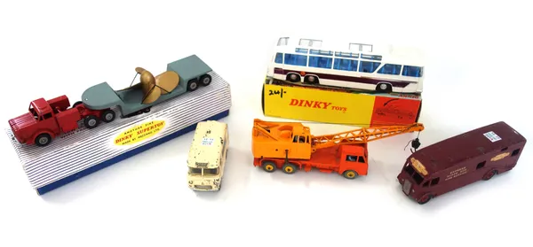 A Dinky 952 Vega Major luxury coach, a Dinky 986 Mighty Antar low loader with propellor, a 555 fire engine (boxed), a 978 refuse wagon, a 290 SRN6 hov