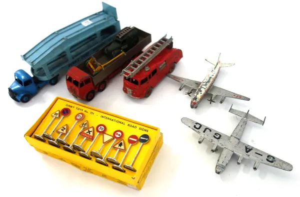 A quantity of Dinky and Corgi die-cast vehicles and accessories, including; Dinky 771 International road signs, a Dinky 982 Pullmore car transporter,