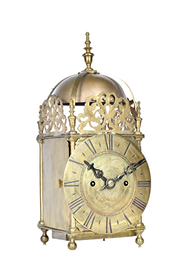 A brass cased lantern clock, late 19th century, the dial detailed 'Thos Moore Ipswich', with a two train movement, 37.5cm high, (key and pendulum).  I