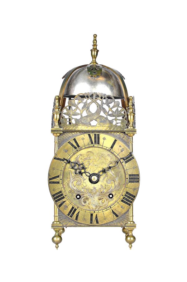 A brass lantern clock, late 19th century, of typical form, the dial engraved 'EDWARD & SONS GLASGOW', the two train movement stamped 'W & H Sch', 38cm