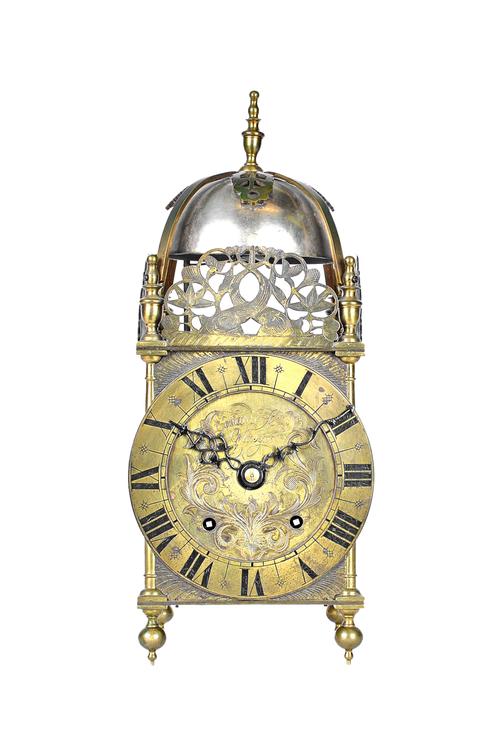 A brass lantern clock, late 19th century, of typical form, the dial engraved 'EDWARD & SONS GLASGOW', the two train movement stamped 'W & H Sch', 38cm