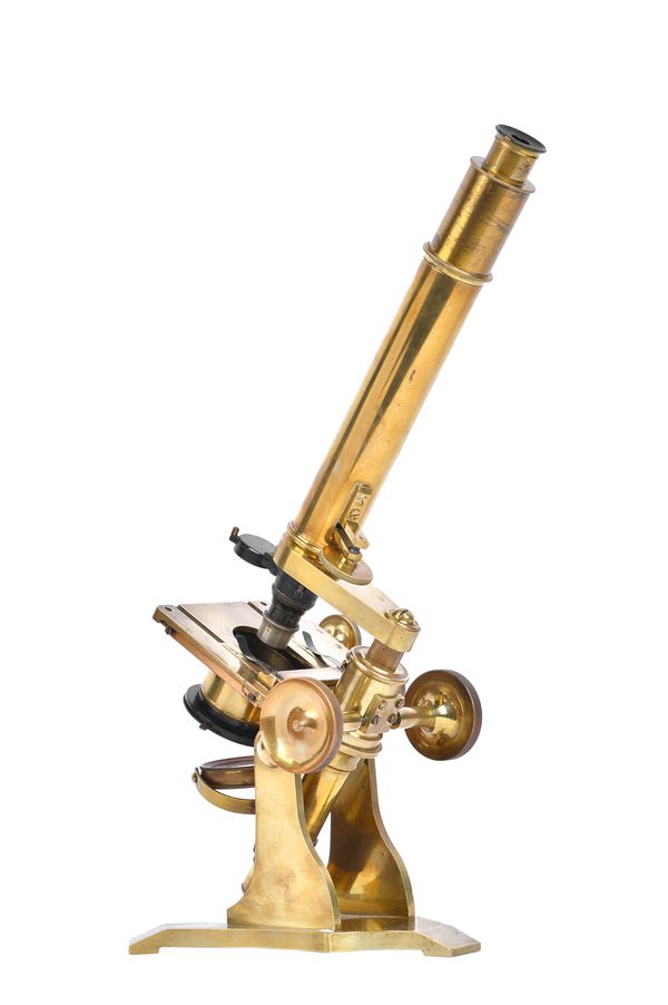 A J.H. Steward; a brass binocular microscope, 19th century, with rack and pinion focusing and fine adjustment, square stage and concave mirror, on a s
