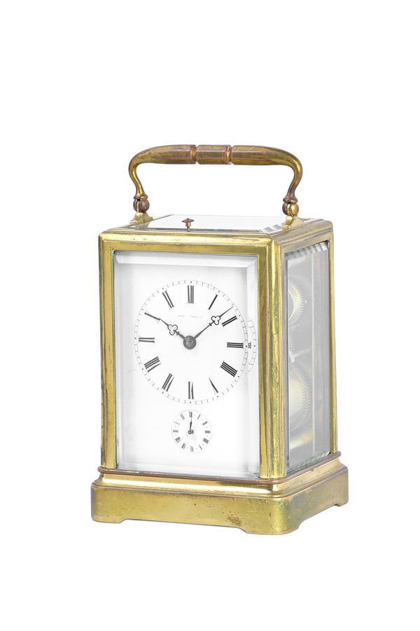 A French gilt brass carriage clock, circa 1870, in a 'one-piece' case with bevelled full glazed panels to the top, front, sides and back, the rectangu