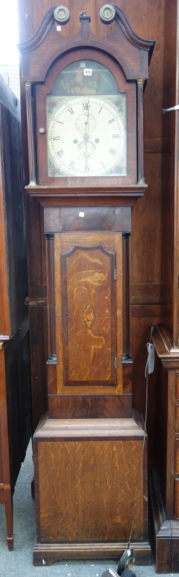 A George III oak and crossbanded longcase clock, J. Bright, Saxmundham, with a swan neck pediment above a conch shell inlaid trunk door, the arched pa