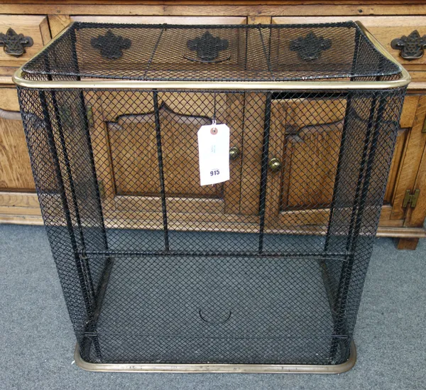 A Victorian wire mesh and brass mounted nursery fender, with hinged top and front flap over a brass kerb, 78cm high x 75cm wide x 45cm deep.