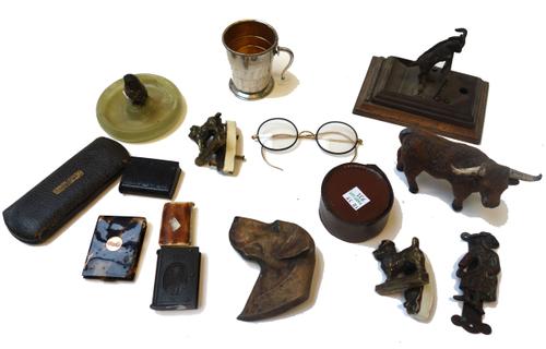 A quantity of collectables, including; an Austrian cold painted owl on a circular onyx tray, a painted metal 'hound' plaque, a silver plated travellin
