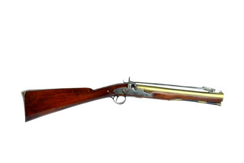 An English large bone Blunderbuss, early 19th century, with brass flared barrel (35.5cm), sprung loaded steel spike, steel lockplate engraved 'Burford