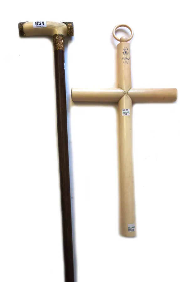 A Victorian rosewood walking stick, with ivory handle and foliate embossed gilt metal mounts, dated 1894 (95cm long) and an ivory crucifix, monogramme