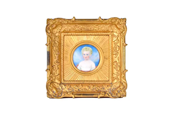 A circular painted miniature on ivory, circa 1815, depicting a young child in a square gilt gesso frame, Harris & Pearse paper label to the rear, the