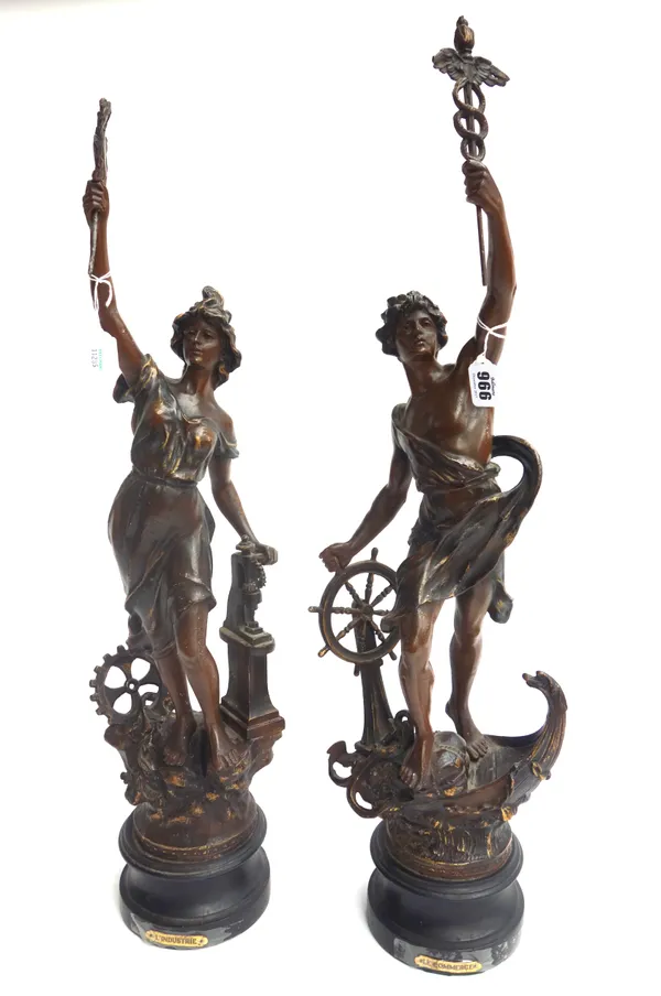 A pair of French bronzed spelter figures, 'Le Commerce' and 'L'Industrie', both on an ebonised wood titled socle, 71.5cm high, (2).