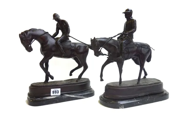 A modern patinated bronze figure of a mounted jockey, raised on a naturalistic shaped base and marble plinth, 28cm high, and another similar modern br