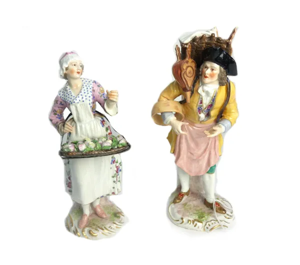 Two Samson figures of street vendors, late 19th century, one modelled as a man with bellows, the other as a woman carrying a tray of flowers, blue pai