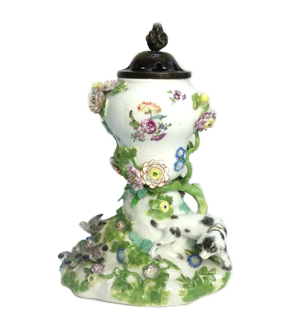 A Meissen pot pourri vase, circa 1760, the basket moulded pear shaped vase painted with panels of flowers and applied with branches of flowers, the mo