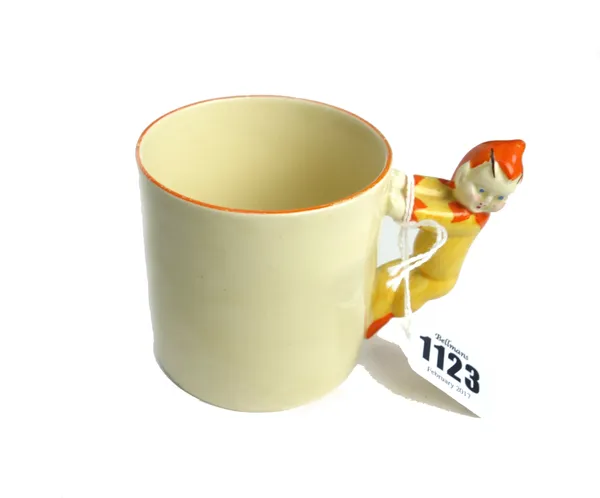 A Clarice Cliff small child's mug, circa 1930, the handle formed as an imp, printed marks, 7cm high.