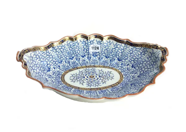 A Worcester porcelain part dessert service, late 18th century, painted in underglaze-blue and gilding with the `Royal Lily' pattern, comprising; a lar
