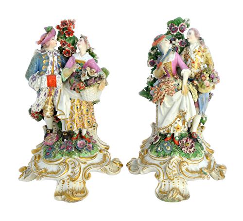 A pair of Chelsea gold anchor groups of courting couples emblematic of the Seasons, circa 1765, each modelled as a young man and woman standing before