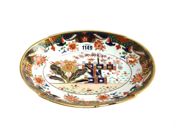 A Spode part dessert service, circa 1815, decorated in an Imari pattern, comprising; a large two handled bowl, three smaller, four oval dishes, three