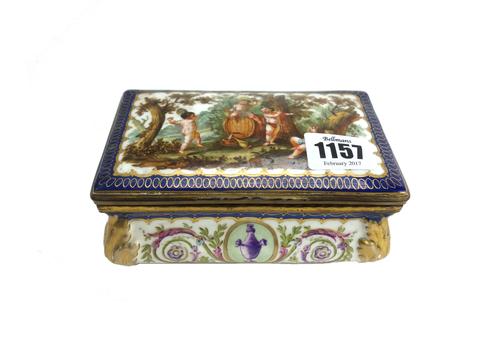 A Continental porcelain casket of bombe form, psuedo Derby mark, early 20th century, decorated with putti against a landscape with urns and foliate sw