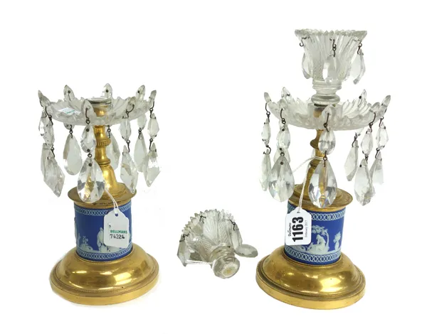A pair of Wedgwood jasper ware brass and glass mounted candlestick lustres, 19th century, the shaped eight point drip pan hung with glass drops over a