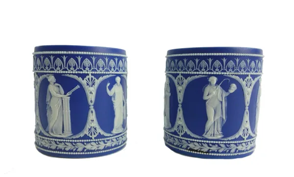 A pair of Adams jasper ware 'barrels', late 19th century, each of cylindrical form with a hole to either end (possibly part of a lustre) decorated wit