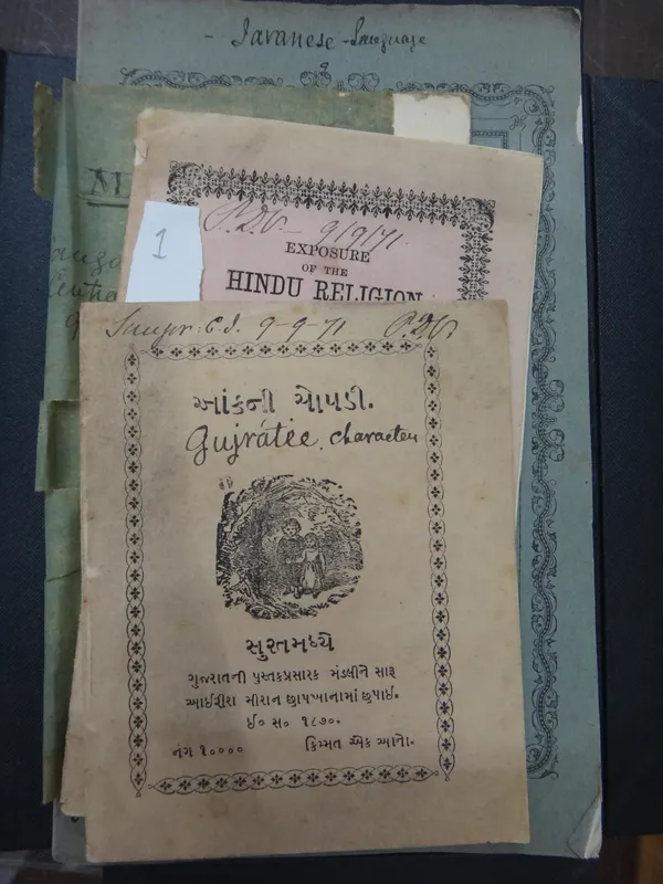 HINDU.  Exposure of the Hindu Religion (with Urdu? text), 34pp. pictorial printed wrappers. (no place, etc., but 1871 ms. date), together with  a Mala