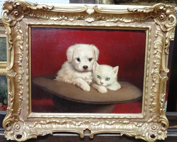 English School (19th century), A puppy and kitten, oil on canvas, 23cm x 31cm.  Illustrated