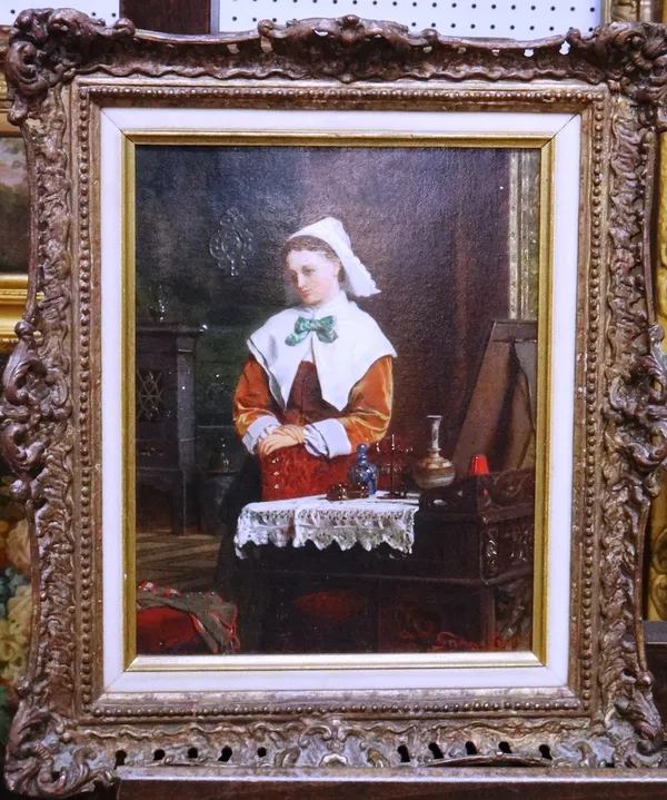 John Seymour Lucas (1849-1923), A young Dutch girl in an interior, oil on panel, signed and dated 1900, 24cm x 19cm.