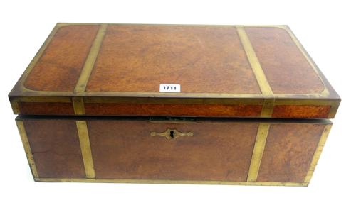 An early 19th century brass bound burr walnut writing slope with fitted interior, 50cm wide x 28cm deep.