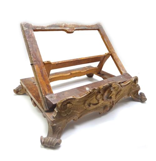 A 19th century Italian gilt table top book stand, 46cm wide x 28cm deep.  Illustrated