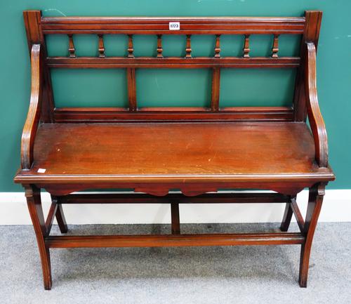 Probably Jas Shoolbred; a 19th century walnut framed hall bench, on sabre supports, 91cm wide x 84cm high.