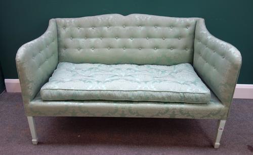 A pair of George III single pattern green upholstered square back sofas on spade feet, 132cm wide x 80cm high.